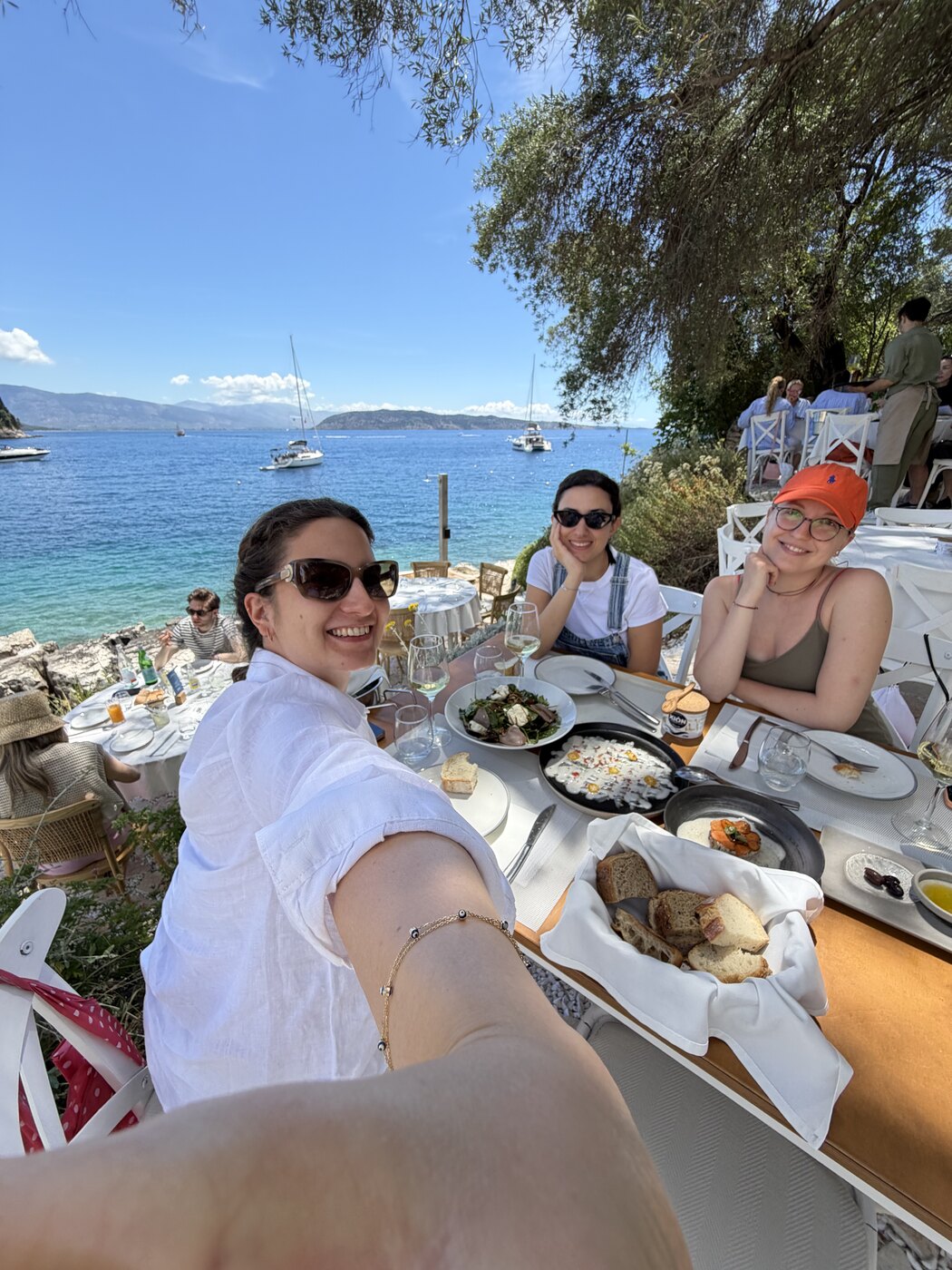 Lunch table by the sea at The White House in Corfu
