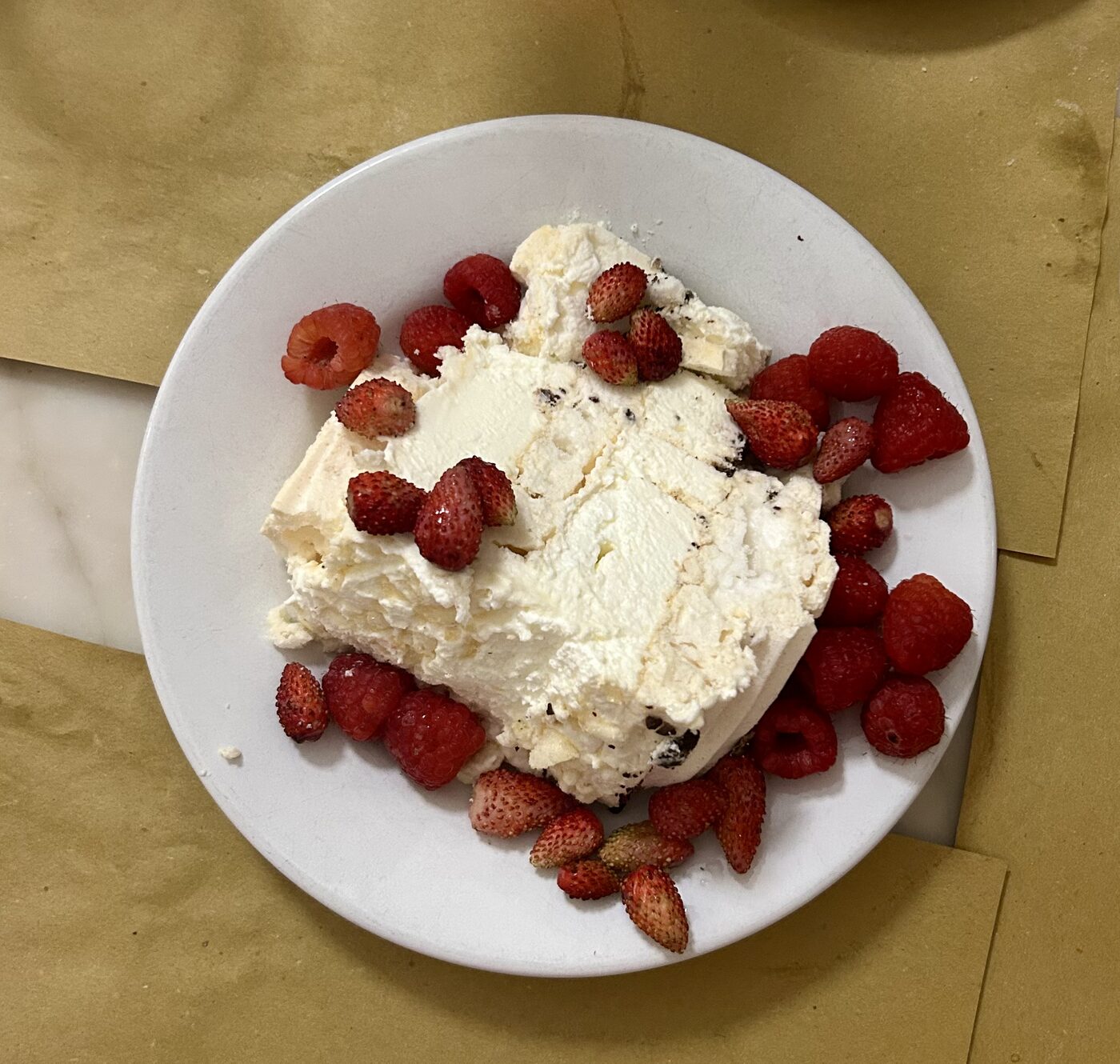 Meringue cake with berries at Trattoria Sostanza in Florence